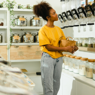 woman browsing bulk shelf in store