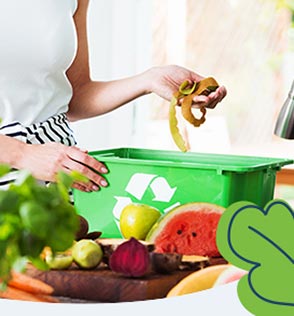 woman composting lemon peel